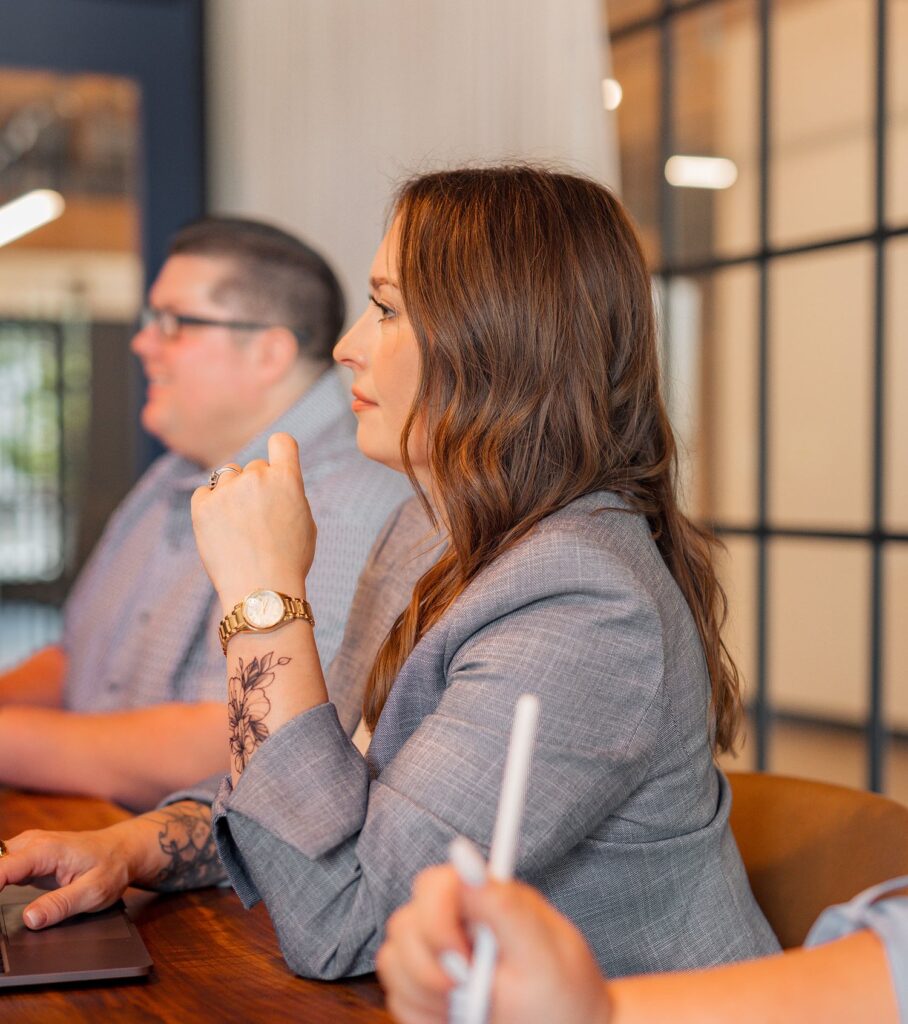 two employees meeting at table